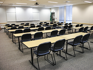 A large classroom seating 60 organized like a traditional classroom.