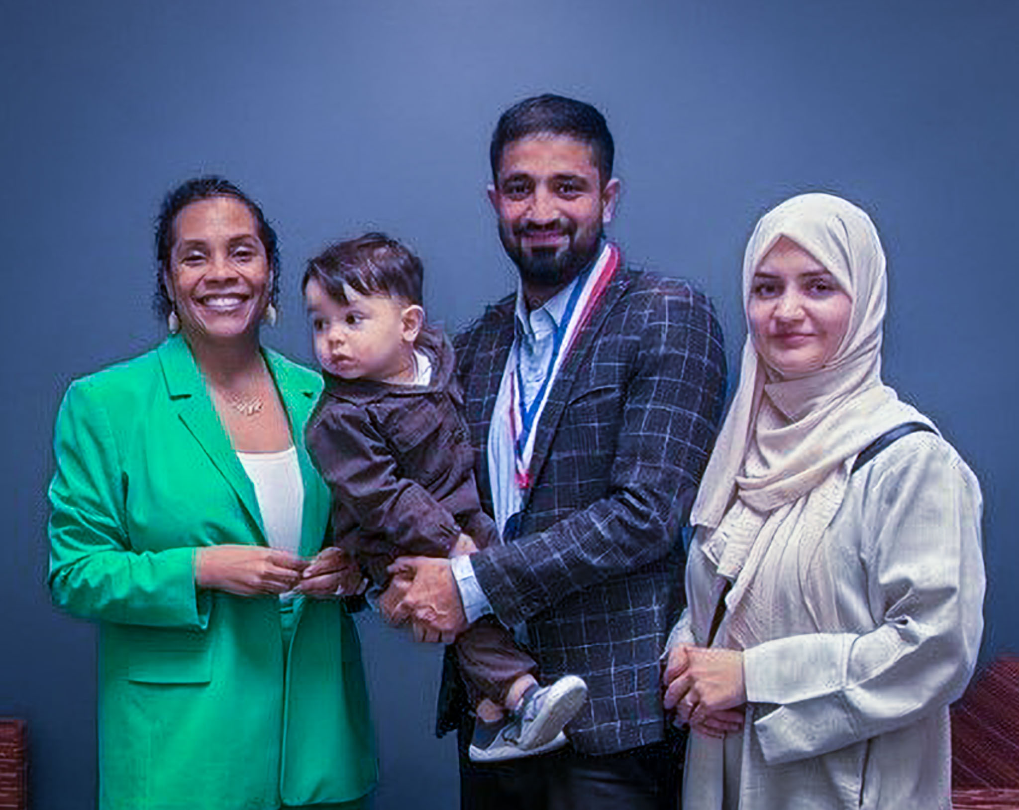 Dr. Yoshiko Harden with Ahmad and his family