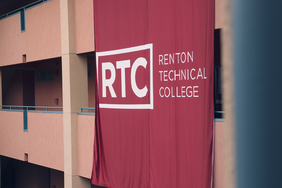 A banner on RTC campus featuring the college logo