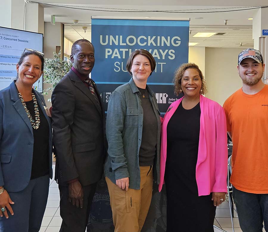 Amy Loyd, Assistant Secretary for the U.S. Department of Education’s Office of Career, Technical, and Adult Education, at left, met with RTC students, from left: Abubacar Kanteh, Bronwyn Sprague, and Mason Dalzell. RTC president Yoshiko Harden is second from right.